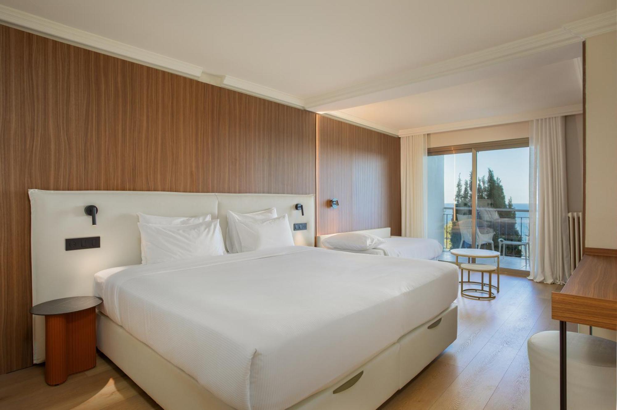 Dreibettzimmer mit Meerblick